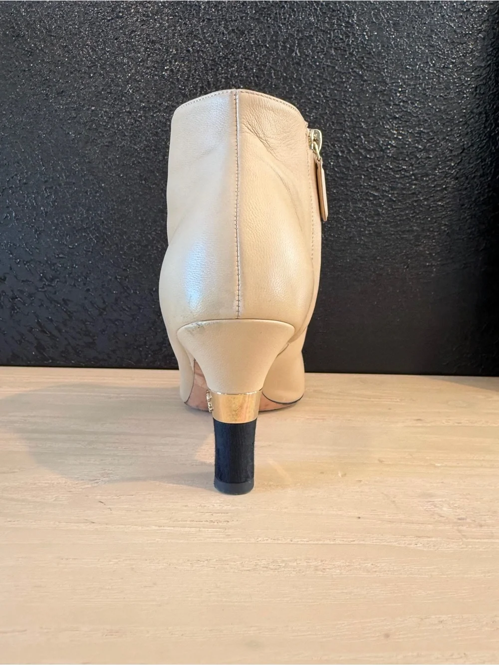 CHANEL Beige Leather Ankle Boots with Black Cap Toe